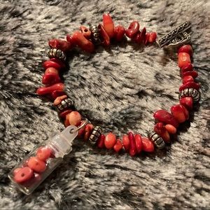 Red Bamboo coral bracelet w/ filled Glass Charm